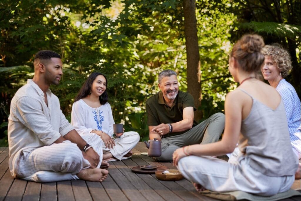 Group of people relaxing together during a detox retreat