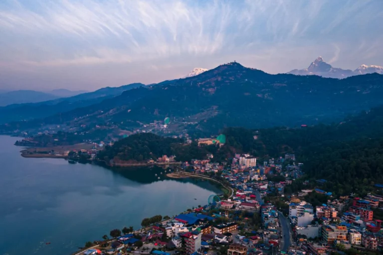 Pokhara, Phewa lake city in the evening