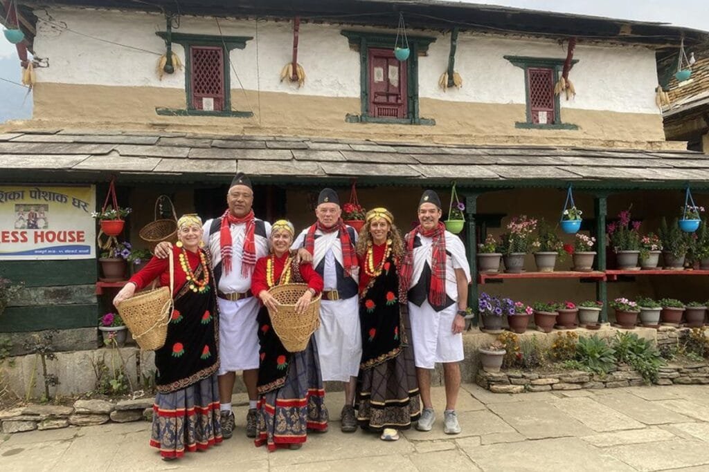 Tourist wearing traditional Gurung dress 