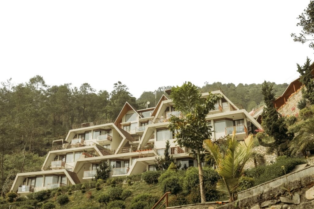 Hillside villas nestled in a green forest setting, perfect for tranquil retreats
