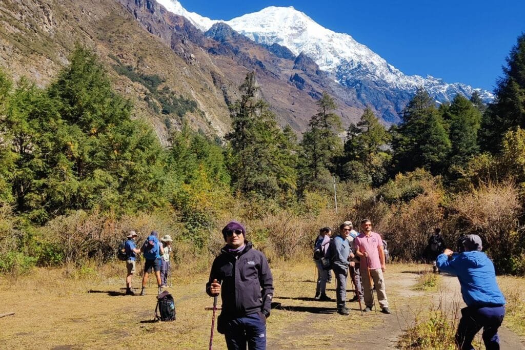 Trekkers taking photos in Langtang trek