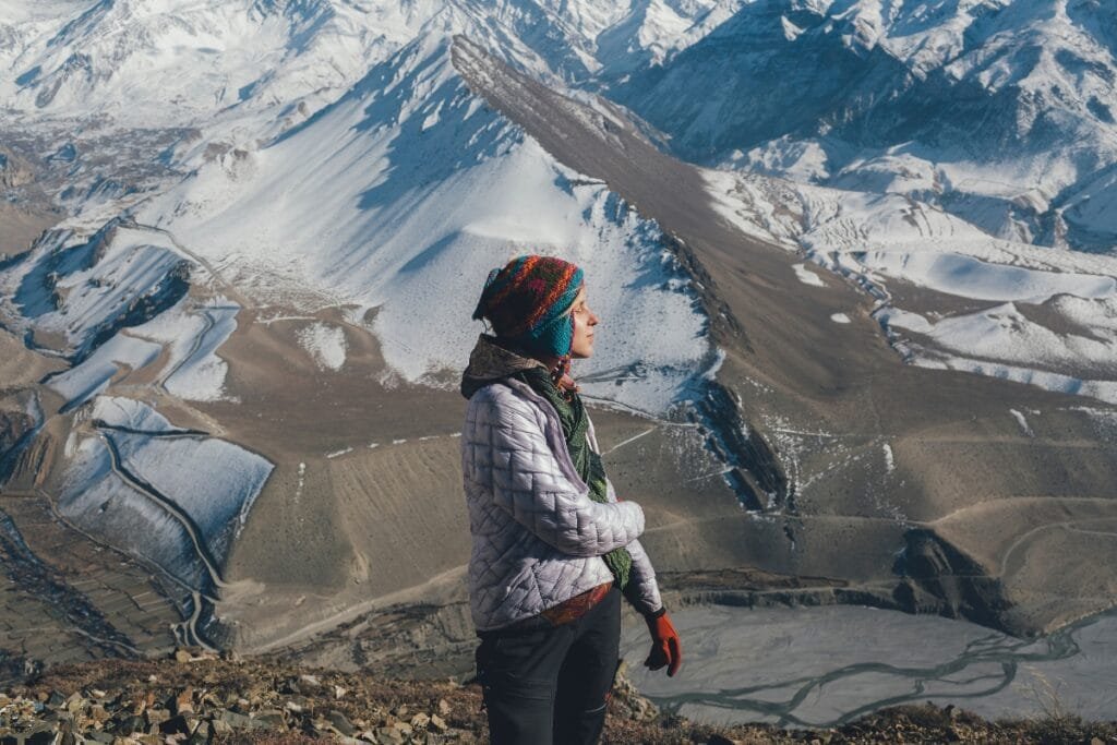 Woman trekker on mountain Himalayas Mustang region Nepal